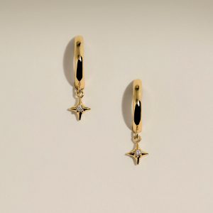 Cosmic Star Charm Huggies in Gold